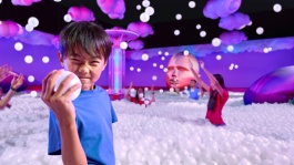 Boy holding bubble ball