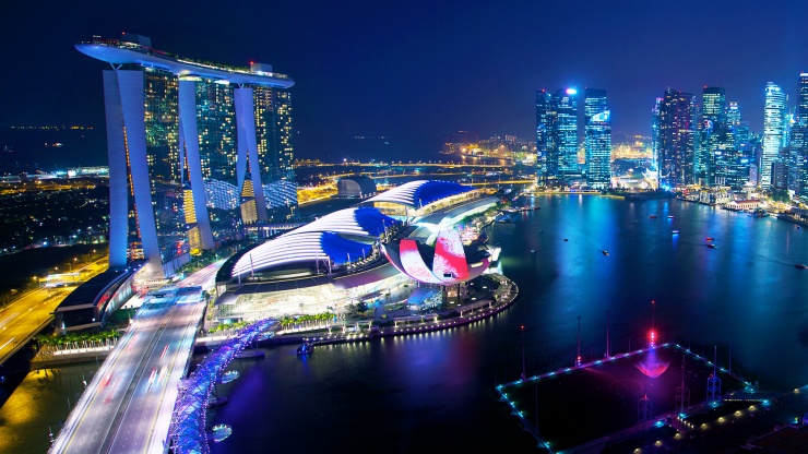 海湾舫地区夜景壮观迷人，滨海湾金沙<sup>®</sup>在新加坡天际线中傲然而立  