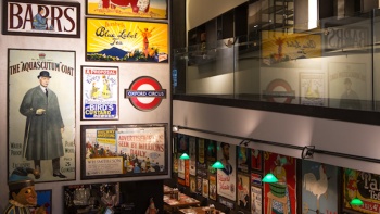 Vintage posters on the walls of MINT Museum of Toys
