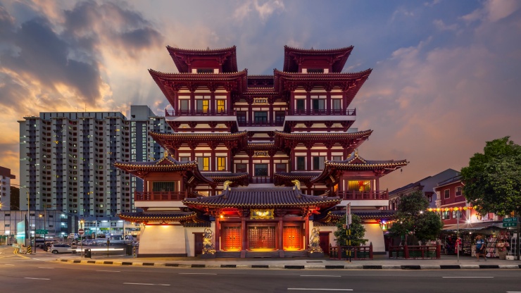 Street view of Buddha Tooth Relic Temple at night 