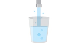 插图：开着的水龙头和一杯装有水的杯子