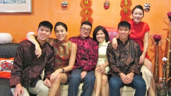 A Chinese family in modern ethnic wear on Chinese New Year